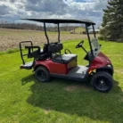 2025 E-Z-GO Valor 4 Electric golf cart in Inferno Red, stock 5879683