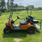 2022 E-Z-GO TXT Gas golf cart in Sunburst Orange, stock 3520485
