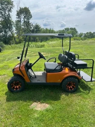 2022 E-Z-GO TXT Gas golf cart in Sunburst Orange, stock 3520485