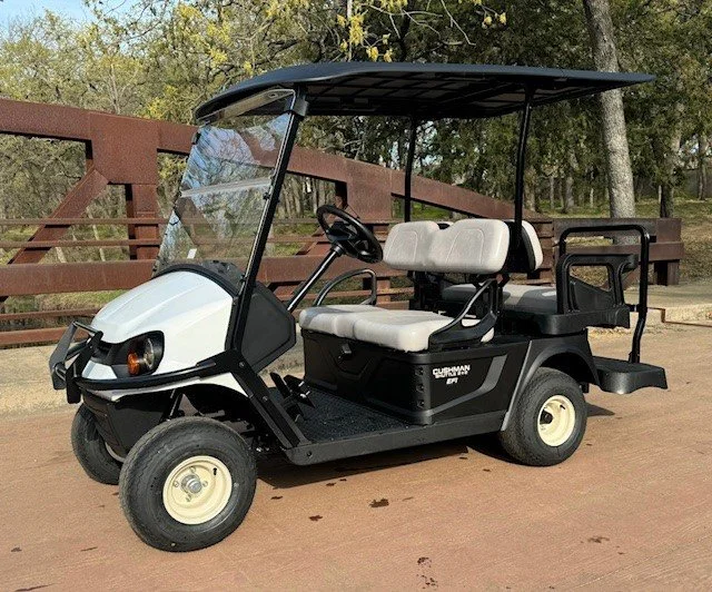EMT-23490-001-shuttle2.webp 2025 Cushman Shuttle 2+2 gas four-passenger golf cart in White