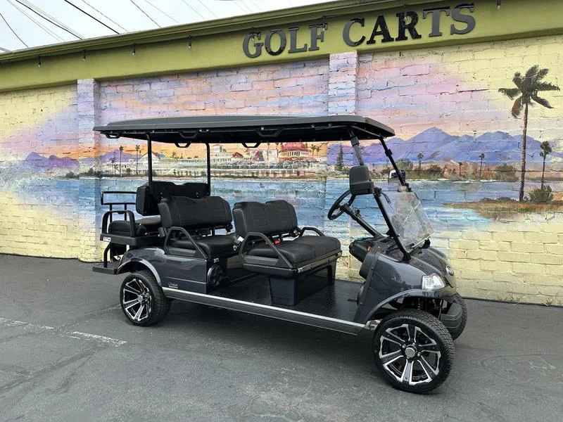 EMT-24895-001-BE075498-70C3-4CE6-8636-AA9EBB9FDABD.webp 2025 Evolution Carrier 6 Plus Pearl White six-passenger lithium golf cart stock EMT-24895