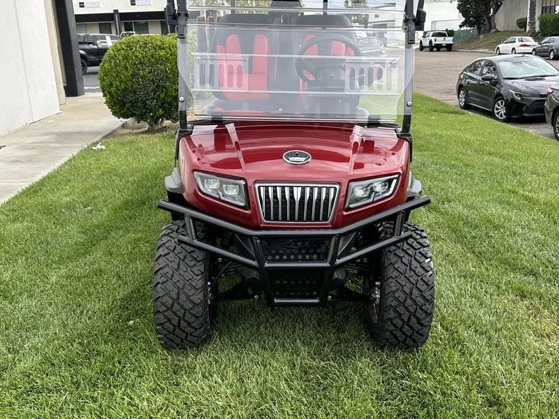 EMT-24945-001-17547BEC-FD55-4406-B4D3-C93F10FCF74E.webp 2025 Evolution D5 Maverick 6 Flamenco Red lifted six-passenger lithium golf cart stock EMT-24945