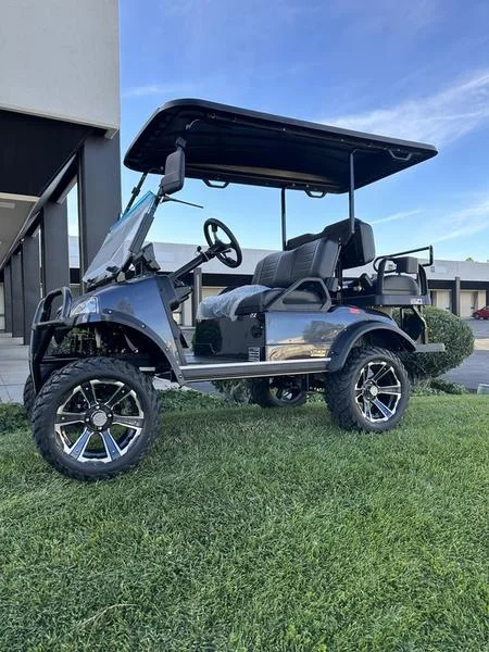 EMT-25741-001-9D2E180C-4E7F-4BE5-B0EC-6AE701D34BA1.webp 2025 Evolution Forester 4 Plus Arctic Grey lifted lithium golf cart, SKU EMT-25741