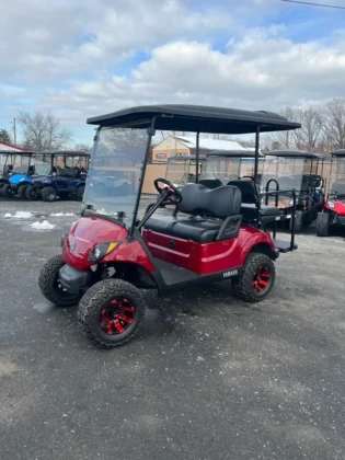 2017 Yamaha Drive2 lifted electric golf cart in Candy Red