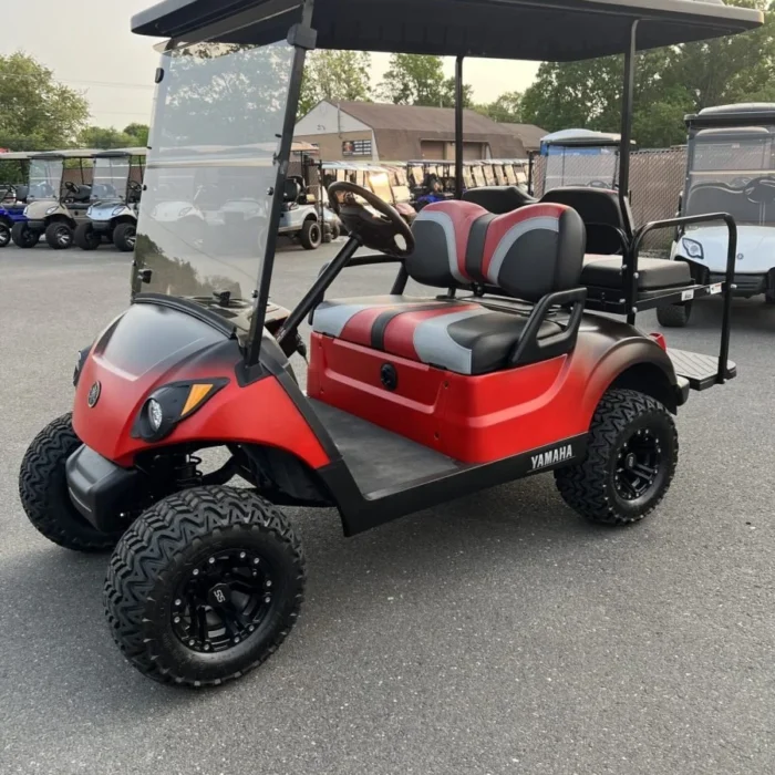 YD23MRF3TER-001-IMG_5079-scaled-1.webp 2017 Yamaha Drive2 48V custom lifted electric golf cart with Matte Red and Black Fade