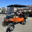 2018 Yamaha Drive2 electric golf cart with Orange and Black Fade and 6-inch lift