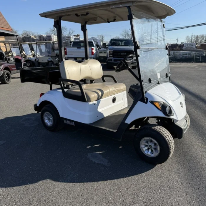 YD2GLWSUB-001-IMG_9829-1.webp 2017 Yamaha Drive2 48V Electric utility golf cart in Glacier White with steel rear utility bin
