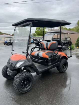 2016 Yamaha Drive lifted electric golf cart with Black and Orange Fade