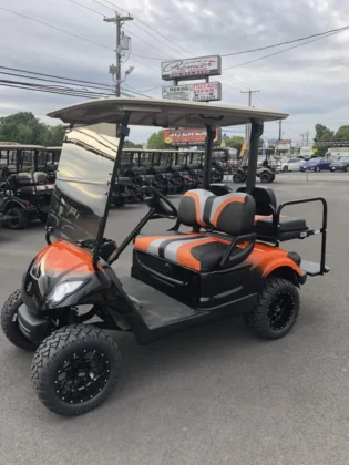 2016 Yamaha Drive lifted electric golf cart with Black and Orange Metallic Fade