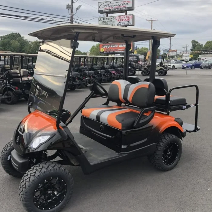 YD3BLORFA3T-001-IMG_3578-scaled-1.webp 2016 Yamaha Drive lifted electric golf cart with Black and Orange Metallic Fade
