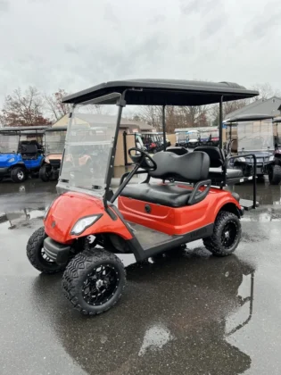 2016 Yamaha Drive lifted electric golf cart in Inferno Burnt Orange Metallic