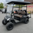 2016 Yamaha Drive lifted electric golf cart in Matte Black with Brown seating