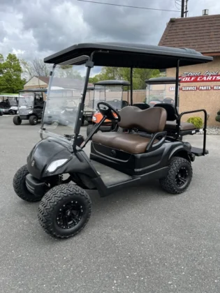 2016 Yamaha Drive lifted electric golf cart in Matte Black with Brown seating