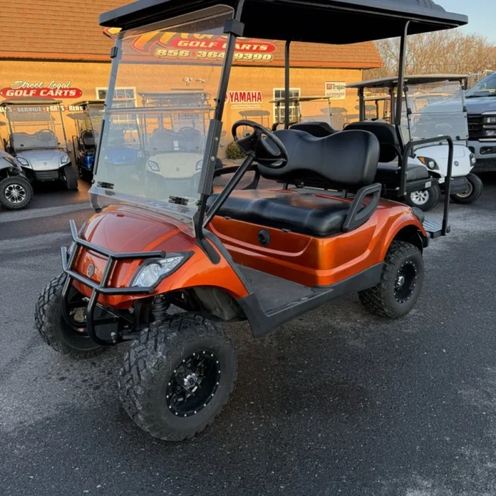 YD3SCOMBLKER-001-IMG_9871.webp 2016 Yamaha Drive lifted electric golf cart in Sunset Candy Orange Metallic