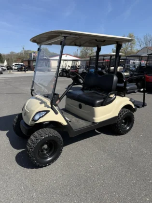 2016 Yamaha Drive 48V lifted electric golf cart in Sunstone Tan with 3-inch lift