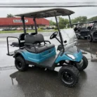 2016 Yamaha Drive 48V custom lifted electric golf cart with Teal and Black Metallic Fade
