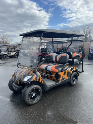 2016 Yamaha Drive 48V custom electric golf cart with Orange and Black airbrush finish